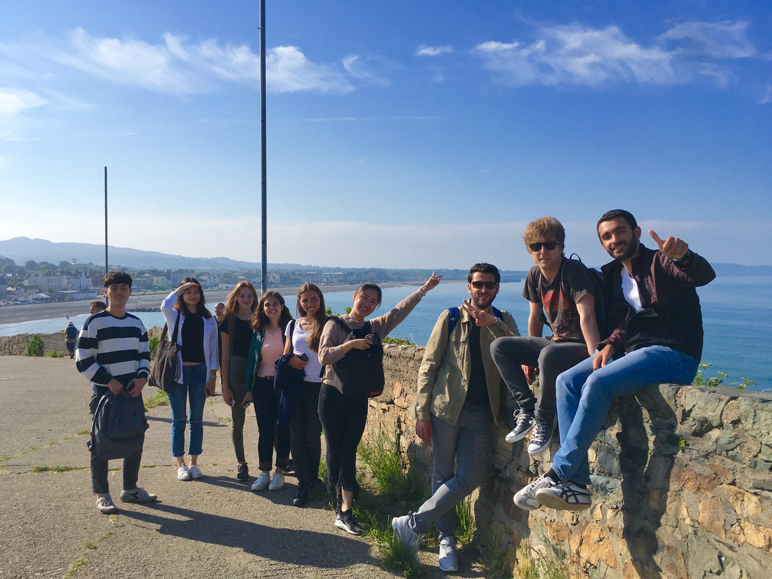 Teenagers english language students smiling on bray pier