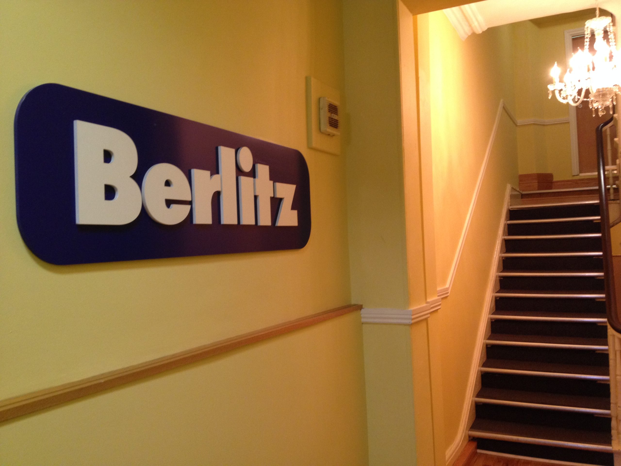 berlitz school logo on wall