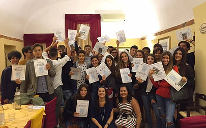 Students with their graduation certificates.